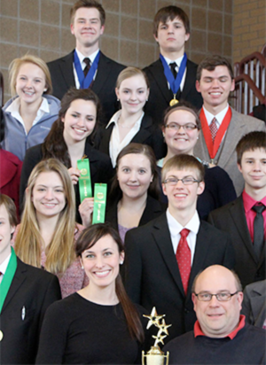 The SAHS speech team is a community of close-knit students who share a passion for public speaking. Junior Carly Johnson, shown second to the left in the second row, competed against the top 24 high school speakers in the state. Photo by Conor McClellan.