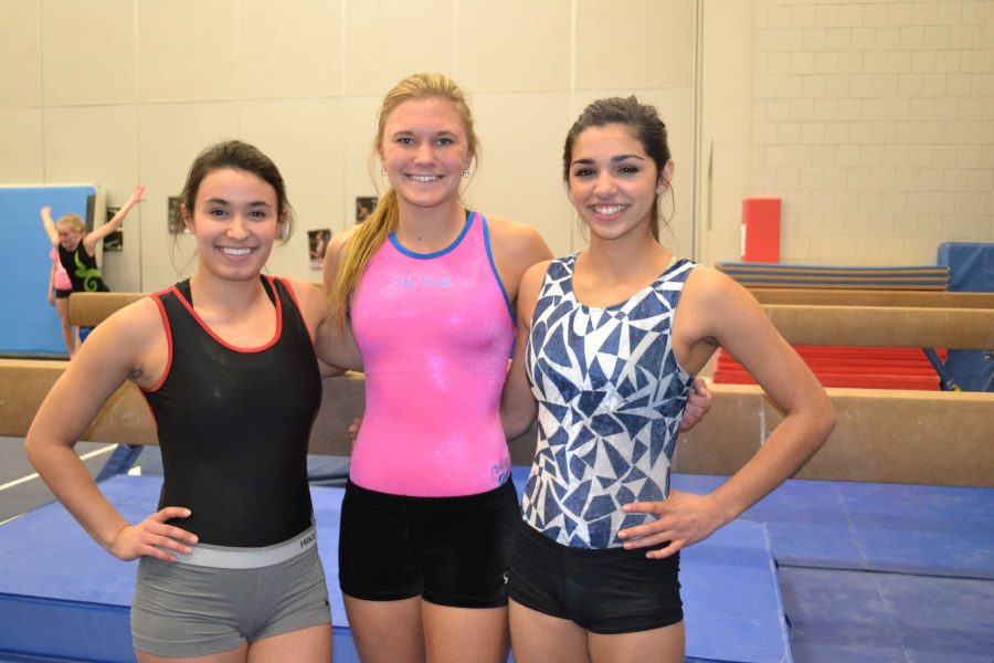 The gymnastics captians, seniors Thalia Anderson and Sidnee Ronsberg and ju...