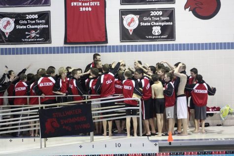 Swim team pushes themselves to improve