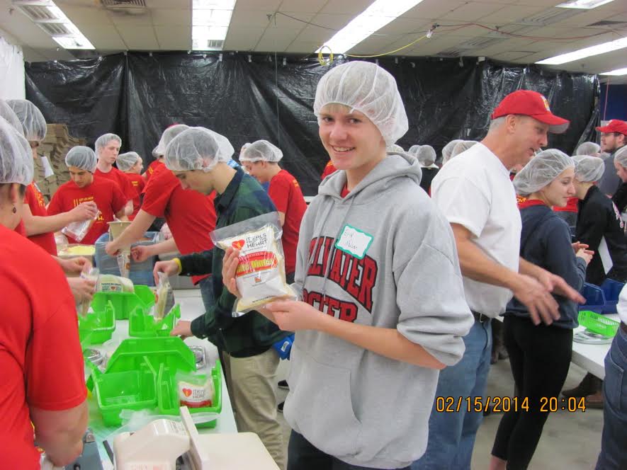 
Many Stillwater students, such as Erik Nelson (’16) volunteer for organizations such as Meals from the Heart to pack meals which will then be shipped off to families in need. “It’s had a huge impact on my life,” said junior Catherine Wessel. “I’ve always loved mission work and directly helping the poor, and it’s just the perfect way to get involved and save another person’s life without even having to go to their country. “