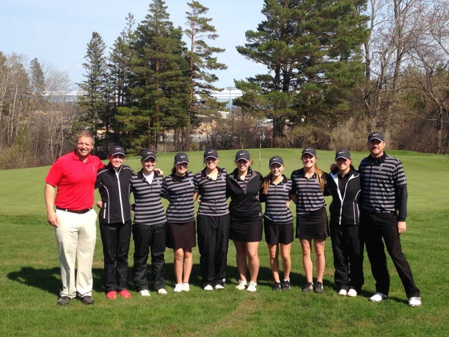 The+girls+golf+team+poses+for+a+picture+after+the+round+at+North+Oaks+golf+course+with+new+head+coach+Peter+Deeg+on+the+right.