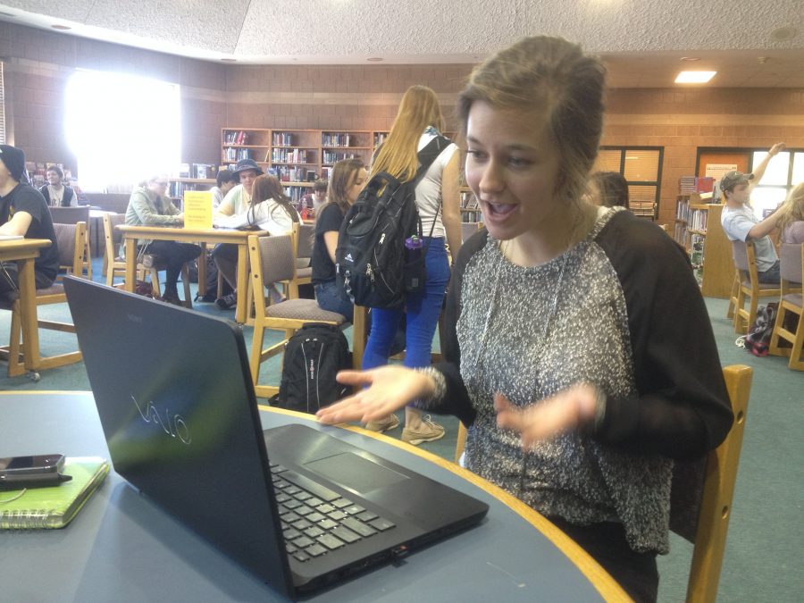 
Senior Eliza Weisberg poses as a student creating a vlog. Vlogs have become increasingly popular in recent years, and Stillwater students are enjoying them now more than ever.