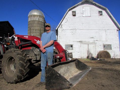 
Senior Paul Volkert stadns proudly in fornt of his family barn. If I left my farm for more than one or two days, complete chaos would break loose in that barn!” Paul preached. “Every day, the cattle have to be fed and the electric fence has to be maintained so they don’t get out of the pasture.”
