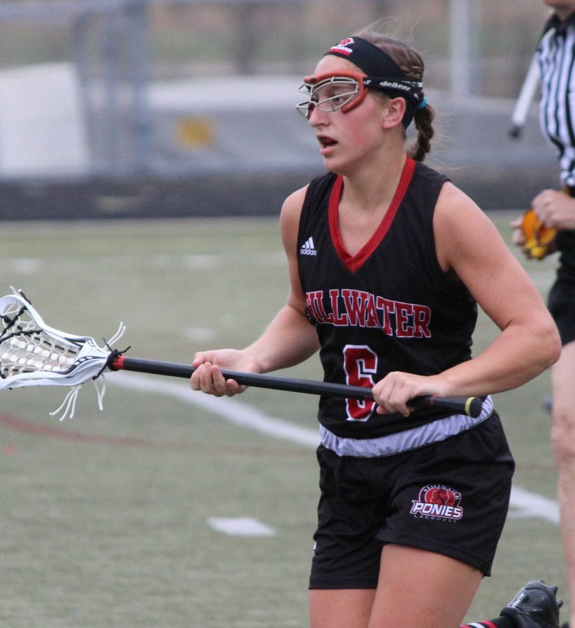 Senior Ashlyn Jelinek, above, is a member of the girls varsity lacrosse team. Their season has been mostly successful with a 3-1 record. Their only loss so far was against Prior Lake in an 8-7 game.
