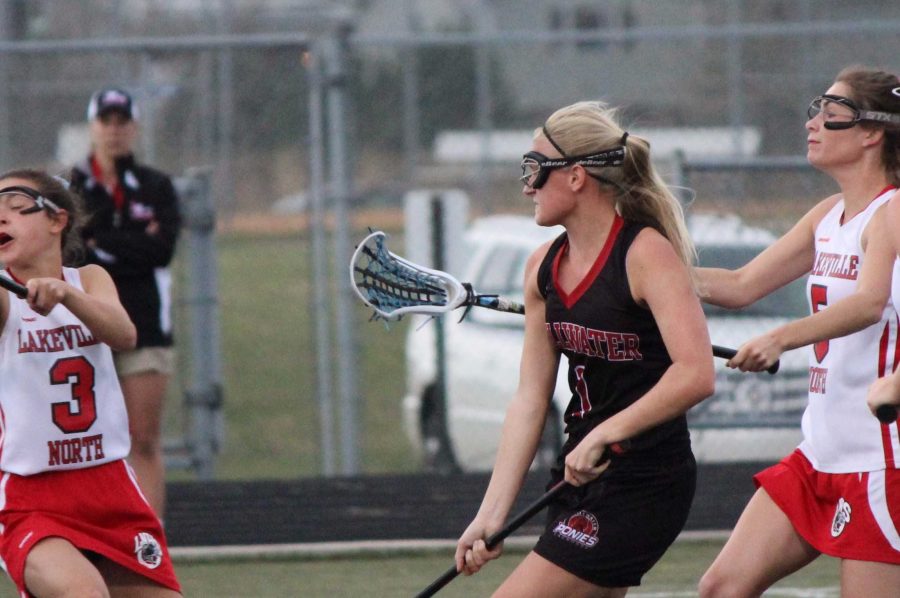 I enjoy lacrosse because of the team. says Senior Remi Larson, and because of the high intensity a game can get into.