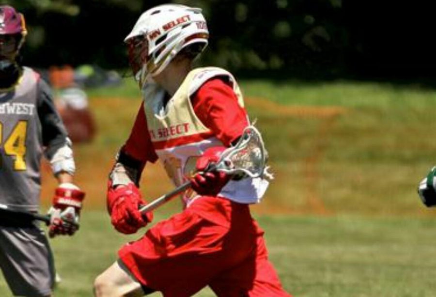 Colin Corcoran weaves through defenders while playing for his summer team, the Minnesota Loons. During the summer I played lacrosse with the Minnesota Loons, Corcoran said. We traveled to tournaments in Denver, Chicago, and Delaware.