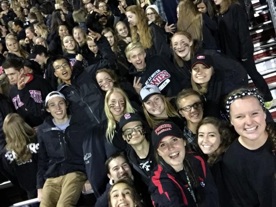 Students at a Ponies football game take a selfie using the selfie stick. I  dont think I use it for anything else, said Senior Ellie McGinley.