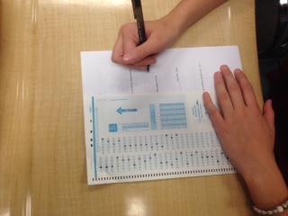 Student takes standardized test, using a bubble sheet