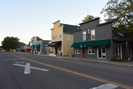 Downtown Lake Elmo Avenue just off highway 5, a few small business pictured. Fire chief Greg Malmquist describes how the development impacts him when he explained, With more development and more residents, the fire department will see our call volume increase. 