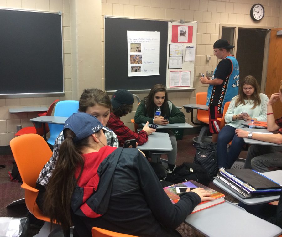 Seen here are students of newspaper working on their photo assignments. Jared Dean, Lauren Feldkamp, Austin Dowdall, Kleio Vrohidis, Annie Seiler, and Amira Noor are all pictured. 