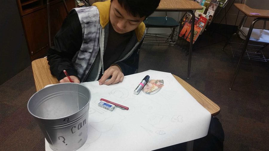 Junior Isaac Yang is the vice president of Kpop club. He is working on a poster for the ramen making contest that the kpop club is putting on.
Yang sais, kpop club is a great place to go have fun and learn about Korean culture.