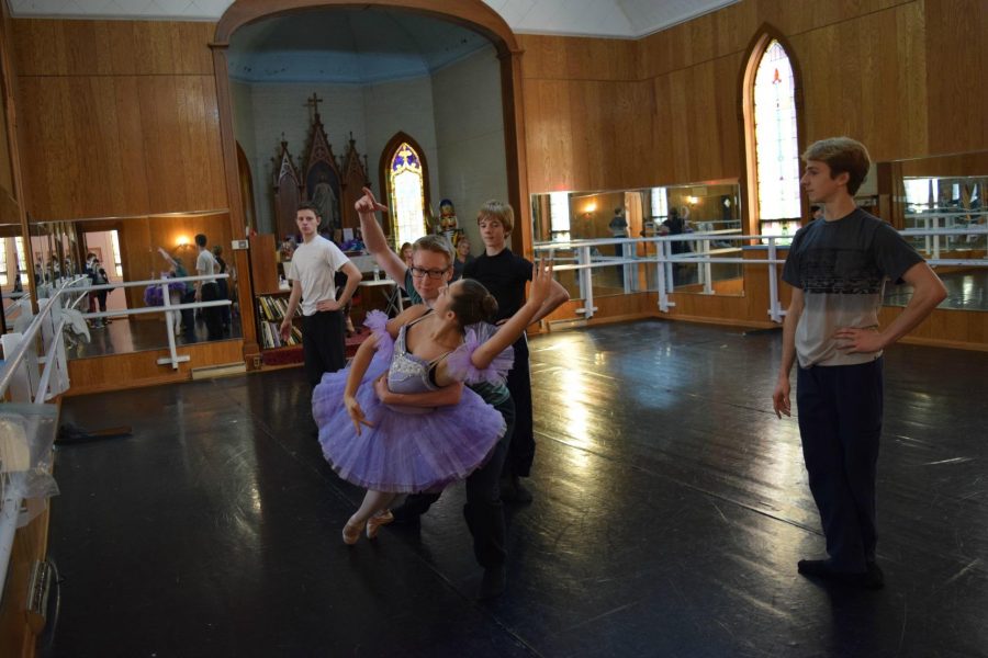 Senior Ava Wichser is surrounded by an ensemble of male dancers (Jeremy Baxter, Joseph Roesler, Sam Kratz and James Kratz) as they rehearse the Dance of the Sugar Plum Fairy. This is a crucial dance in the show that involves precision and technique, especially for Wichser, who must perform this well-known dance on pointe. “You need to be balanced in every aspect of your body. Flexibility and strength are key to making pointe work look easy,” says Wichser.