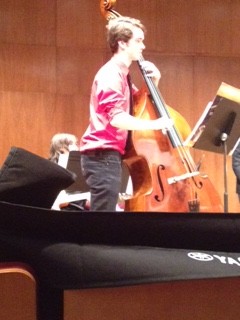 The jazz bands perform in Lawrence, WI. Senior and bass player of the jazz band, Clay Knoll is playing his bass.