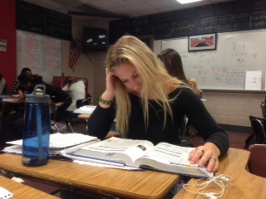 Student, Kathleen Billingsley, working on her math homework in Mr. Hamiltons Algebra 3 class