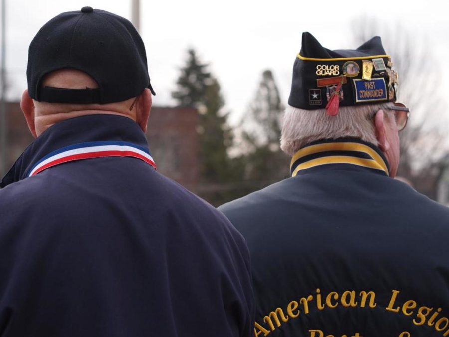 Two members of the American Legion attend the Veterans Day ceremony at the Veterans Memorial in Stillwater. 