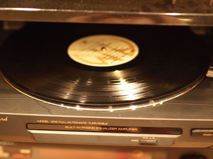 Many people enjoy using record players and listening to records instead of CDs or even on their mobile devices because they think its cool or trendy.