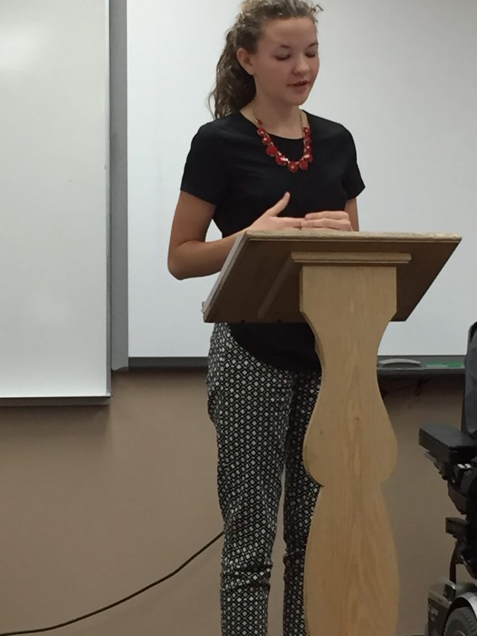 There are a total of 12 rounds in a single debate with each turn having a specific purpose and having a set time limit that cannot be exceeded. “There is so much more interaction between you and the opponent when they are cross-exing you compared to other rounds,” says sophomore Sophie Rondeau. Stepping up to the podium, Rondeau composes herself in order to make her point and to give a clear understanding of the answers in response to the questions that she is being asked in this round of cross-examination.