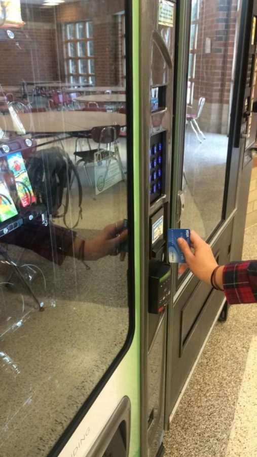 The credit card vending machine in the cafe, now trending 
