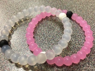 Lokai donates 10 percent of their profits to charities, which is why junior Megan Felsch bought one for herself. “I like the saying and it went to a good cause. Also I had wanted one for a while, and I was really excited when I finally found one,” said Felsch. One of the most popular bracelet sold, aside from the clear one, is the pink one. When purchased $1.80 will go to the Susan G. Koman fund.
