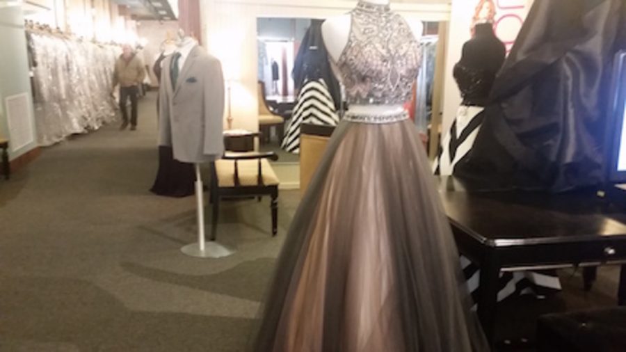 The style is changing every year and Our Shop is always up to date on styles, colors, patterns, and so much more.
 The two piece dress is definitely the new style, with the ball gown skirt, also dresses with detail on the back and cutouts are very popular this year said manager Beanee Hoff.