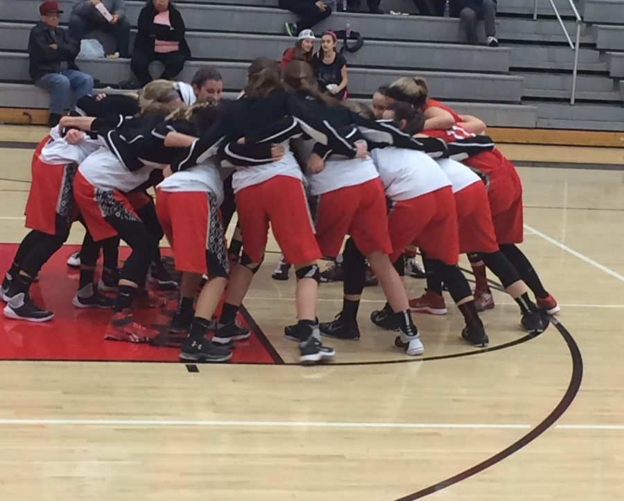 After all the warm up drills, the girls will create a huddle. “We usually talk about what we are playing first, like we will usually say the first play of the game we are going to run and what defense we are going to be in and who their main shooters are,” junior forward Emma Murphy says.