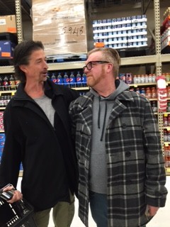 Tom Styrbicki (left) and Mark Johnson (right) pose as brothers after having met each other for the first time in Cub Foods. Johnson said, Hey bro. Whats up bro? This is my brother Tom. Both fall into a fit of laughter after Johnson says This is my brother Tom.