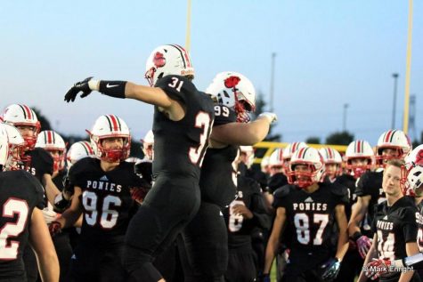 Seniors Zach Kelly and Andrew Hoy celebrating the win over White Bear on senior night. Kelly says, If you are one of those people willing to put in extra work, it will pay off.