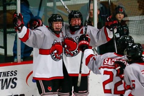 Senior captain Simon Sagissor and junior assistant captain Luke Manning embracing in a hug after a goal was scored. The boys are ranked second in the state and are looking to win in the section finals and make it to the state tournament. Weve got a special group of kids that have a lot of chemistry which can make a big difference in close games, Manning says.