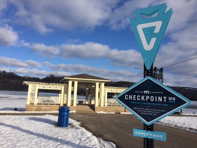 The sign posted in front of the Gazebo indicates that whoever takes their picture with the sign is one step closer to receiving one of the prizes given away to those who participate in the 8-week-long scavenger hunt called CheckpointMN. Stillwater is to be one of 10 checkpoints located throughout the state. “I like the idea of Explore Minnesota because it gets people to other towns they might not be familiar with,” says Valley Bookseller Manager Kathleen Eddy.