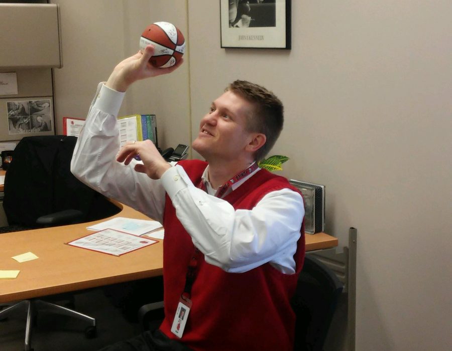 Principal Rob Bach tries to relive his college glory days by shooting some invisible hoops in his office. Bach has been compared to pro athlete Kristaps Porzingis, a basketball player for the New York Knicks. Bach says, One similarity between us [Bach and Porzingis] is that I did play basketball in college at St. Olaf. I love basketball and so does he [Porzingis].