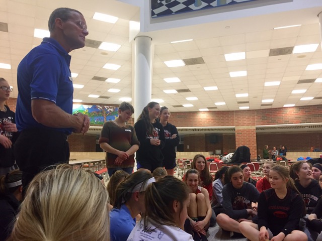 The girls lacrosse team listens as Raisser talks about how to maintain a positive mindset during the season. I learned a lot from Rick. He really got into my head on what it means to be a dedicated and hard working athlete, senior Sara Stickler says.