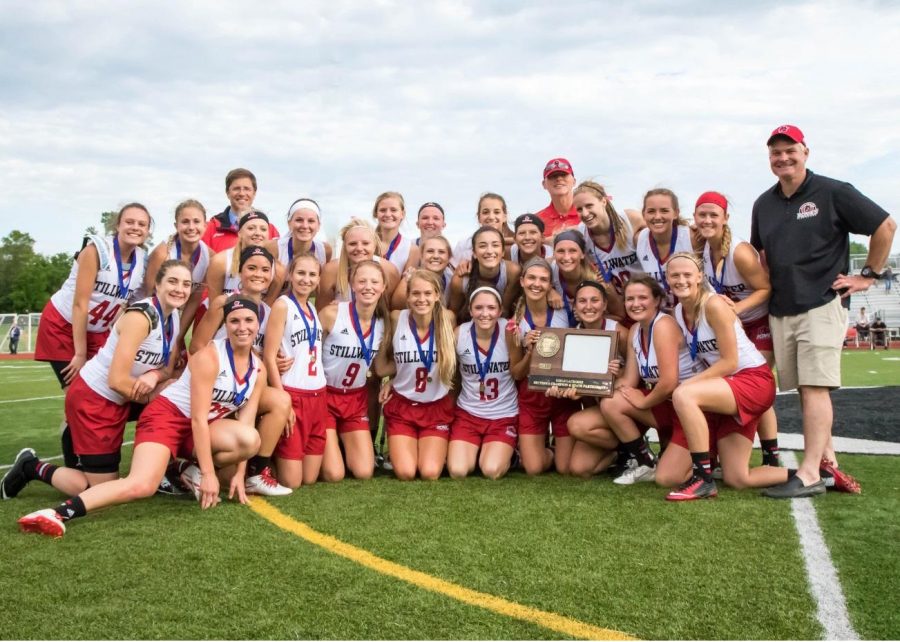 The Stillwater Girls Lacrosse team pose with their plaque after winning their section last spring. Carly has the heart and love for the game that most players don’t, which gives her the extra advantage, senior Sam Houle says.