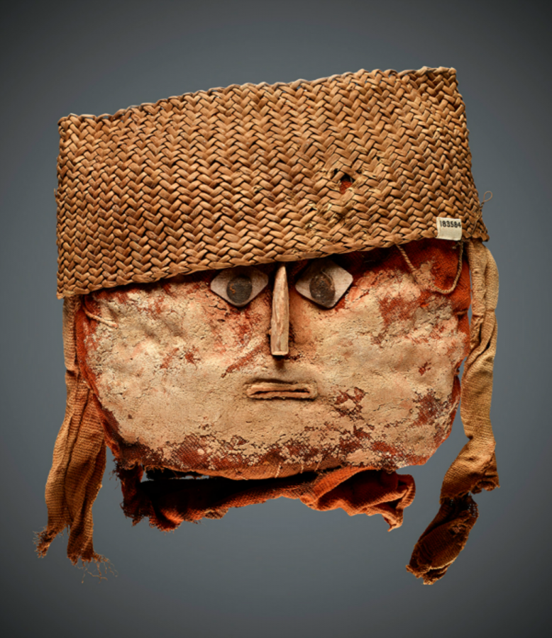 A Chancay head, or “false head” sat atop a mummy in the Chancay culture. “The Chancay people mummified their loved ones in a curled up position and wrapped them in colorful ponchos and cloth,” says the Museum. 
