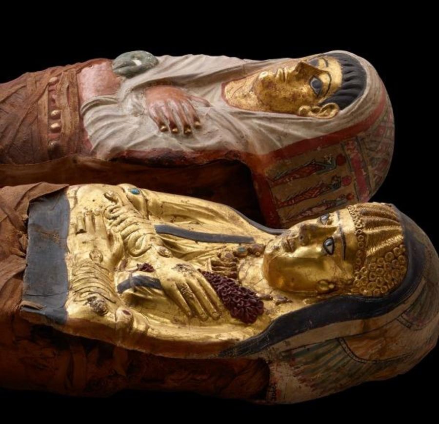 The mummies pictured are from Ptolemaic Egypt and reveal a young sister and brother, who died in approximately 300 B.C. “Both are portrayed wearing a mix of Greek fashions (like the golden girl’s curls) and Egyptian fashions,” says the Museum.