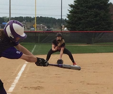 Third baseman Alex Ehde gets in position as she anticipates the ball coming to her during the game against Cretin-Derham Hall. “My hopes for the team this year is to have a good conference record and to hopefully make it to state! I think we are more committed this year. Every game and practice matters and I believe my teammates feel the same and work hard. As long as we play for each other and communicate we can go far,” says sophomore Alex Ehde.
