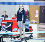 Photo Courtesy By Angie Kranz - “This year is my first doing swimming”, Peyton Classon, as she is just about to dive in a dual meet, which stillwater hasn’t lost in over 13 years with coach Brian Luke at the helm.
