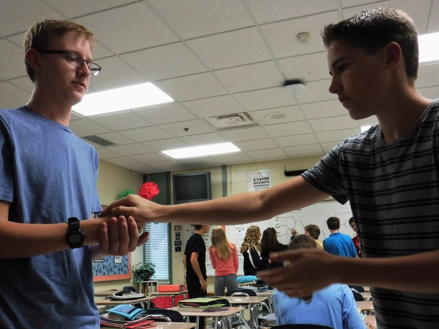 AJ Gunderson and David Helgeso have a friendly Rock, Paper, Scissors competition to get warmed up for the rest of the day. I think that if the teachers dont buy into it, it will be wasted time. If everyone buys into its purpose and uses it in a productive manner I think it can be a great thing, Meyer says.