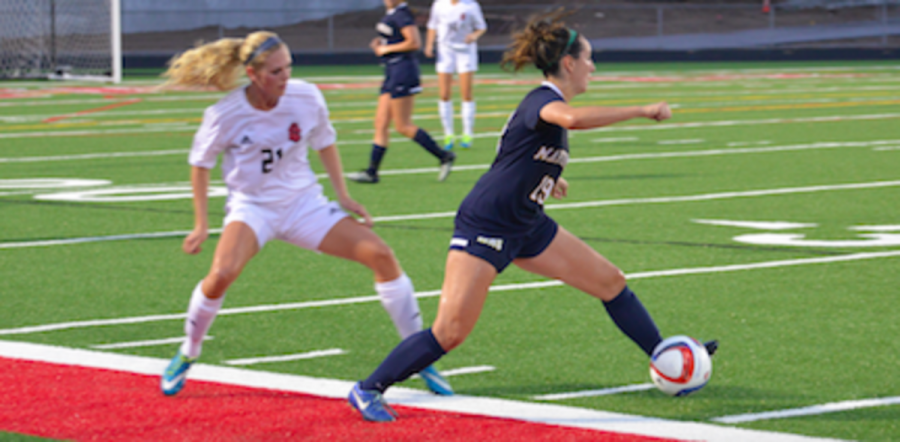 Photo Courtesy Wendy Clements 
This photo was taken on September 7, 2016 at the Stillwater High School soccer field. In this photo Hannah Anderson is watching intently and waiting for the perfect moment to steal the ball from her opponent. She is always watching and is a very strategic player. Hannah is able to stay on her toes, staying low which puts her in a very athletic stance.