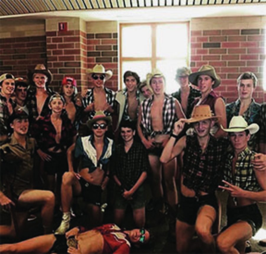 Stillwater boys cross country team takes on Western Day with daisy dukes and some ripped up flannels! Junior Noah Kneeskurn says, Its pretty awesome going to school and dressing up with some of the team members. 