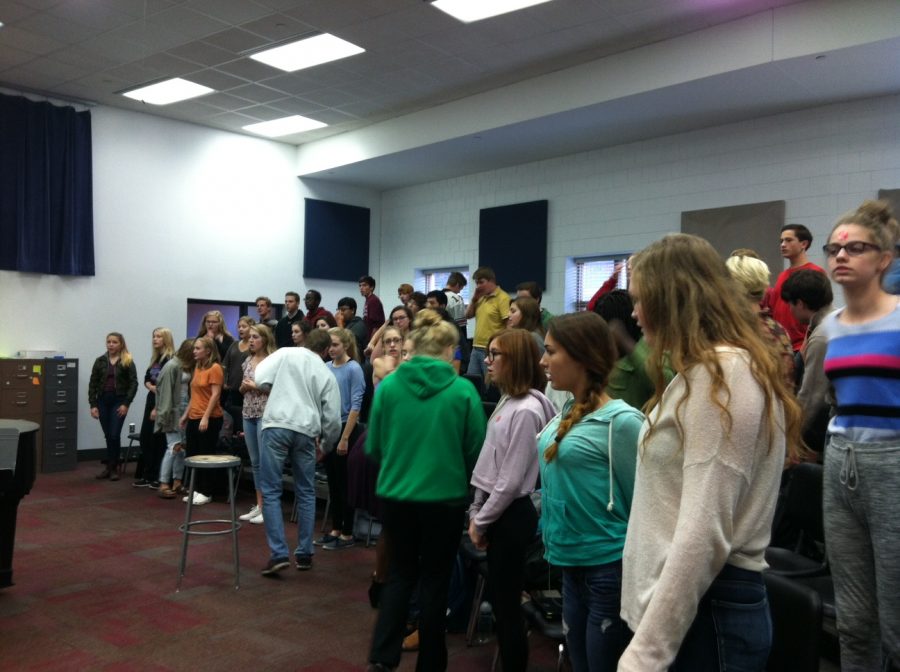 Students stretch out their arms and necks to prepare to sing what Mrs. Mitchell has planned for the day, usually consisting of a run-through  of a select few of the songs in the Choirs repertoire. Also, Mitchell has some students focus on specific voice parts by sending them off to a separate room to do a sectional, where a specific voice part learns their notes on their own, off away from the rest of the choir.  