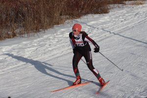 Junior Rana Kraftson competes at the Suburban East conference race. Junior Hannah Brown says, This year looks really promising for us and we are all getting anxious to race on snow again. 