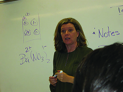 Chemistry teacher Shelly Holmberg back teaching in her classroom after her recovery from surgery to remove her benign brain tumor. “Missing the first few weeks of school was awful. It was hard not being able to have a normal life and I love normal and I love my job, I really do,” Holmberg says.