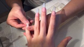 The plastic tips are being glued onto the natural nail, from there they are cut down to the length and shape the customer prefers. I hate painting my nails and with acrylics I can just pick out a color and be good for a month or so before I have to go in and get them done again, senior Hannah Haslach says.  