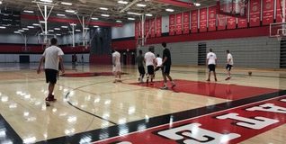 Photo By Noah Ness-
Members of Ponies Basketball play in an "open gym" game on a morning before school.  Sophomore Nate Shikenjanski, one of the youngest members of the team, cites Junior Manny Jingco and former Pony Isaiah Dobson as guys he learned a lot from.  "Those guys got me better defensively and made me a better overall player."