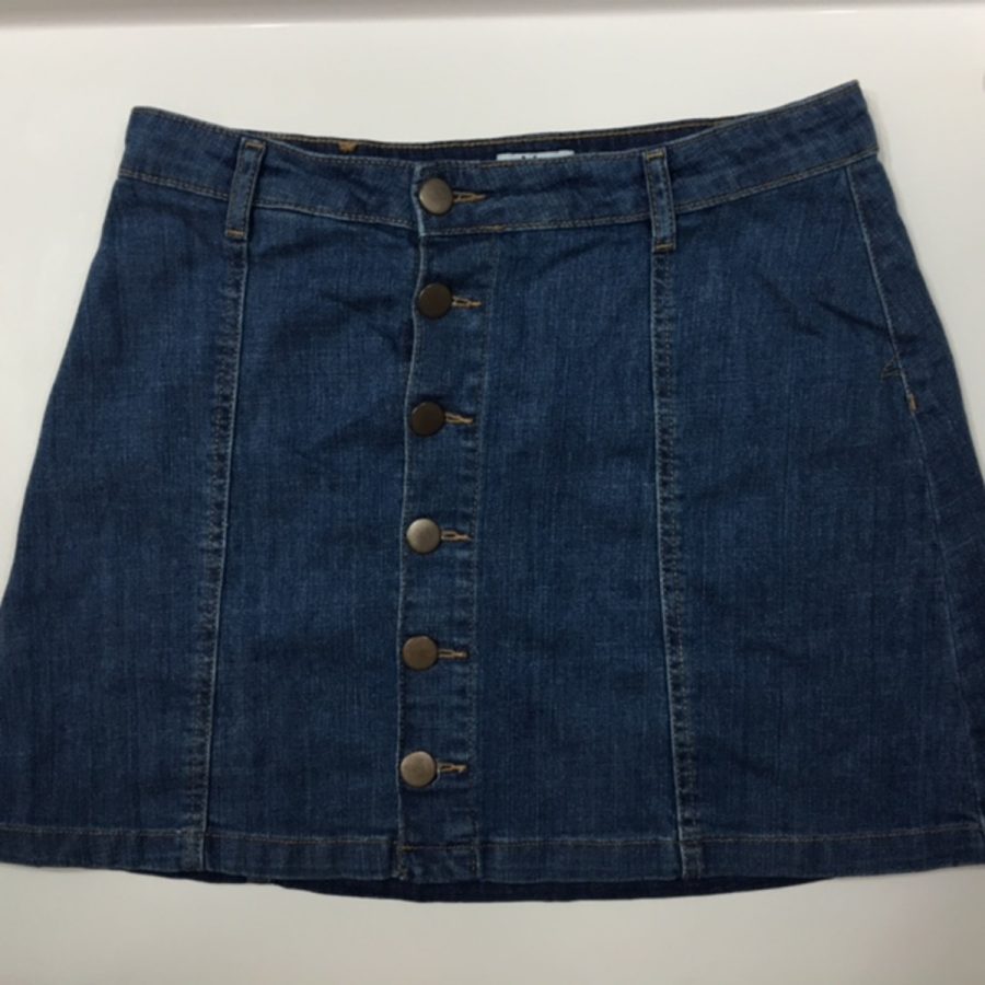 A jean skirt from the 80s that has come back into style. I love the older fashion, men and women were so classy, says Sitz.