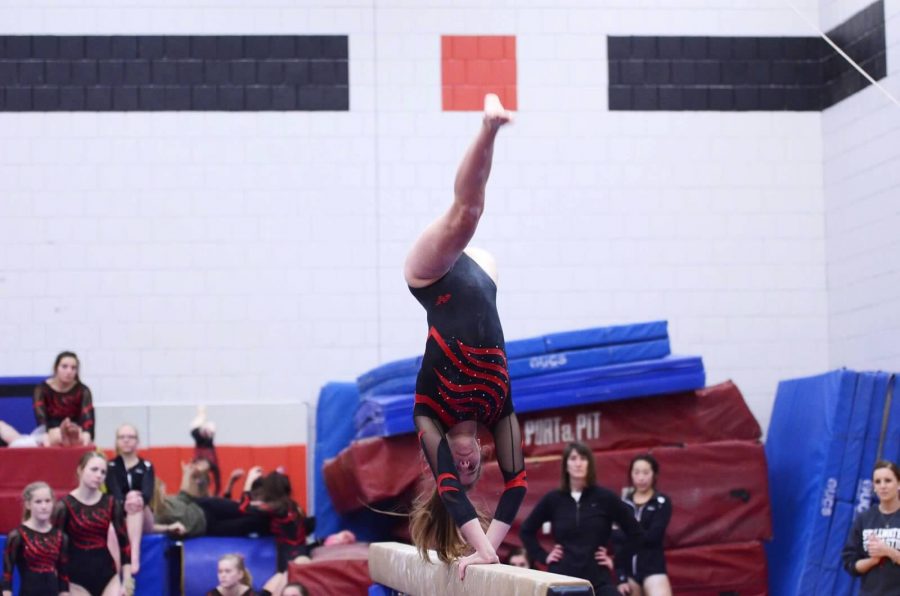 Captain Danielle Keran performing on the balance beam in the meet at SAHS.  She had a great run this time. Keran says, “I just went and did what I knew I could do, it was a lot of fun and felt great to be out there again.”