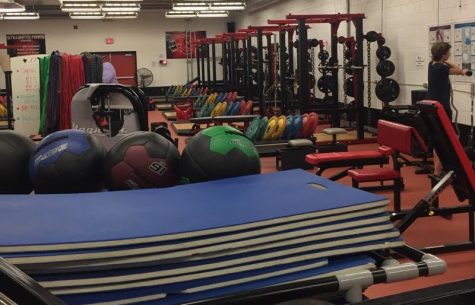 The bench bars on the right are used for benching and tightening up the pectoral muscle. Richman says, I like to use the benches when there is something in the upper body that I need to be stronger.