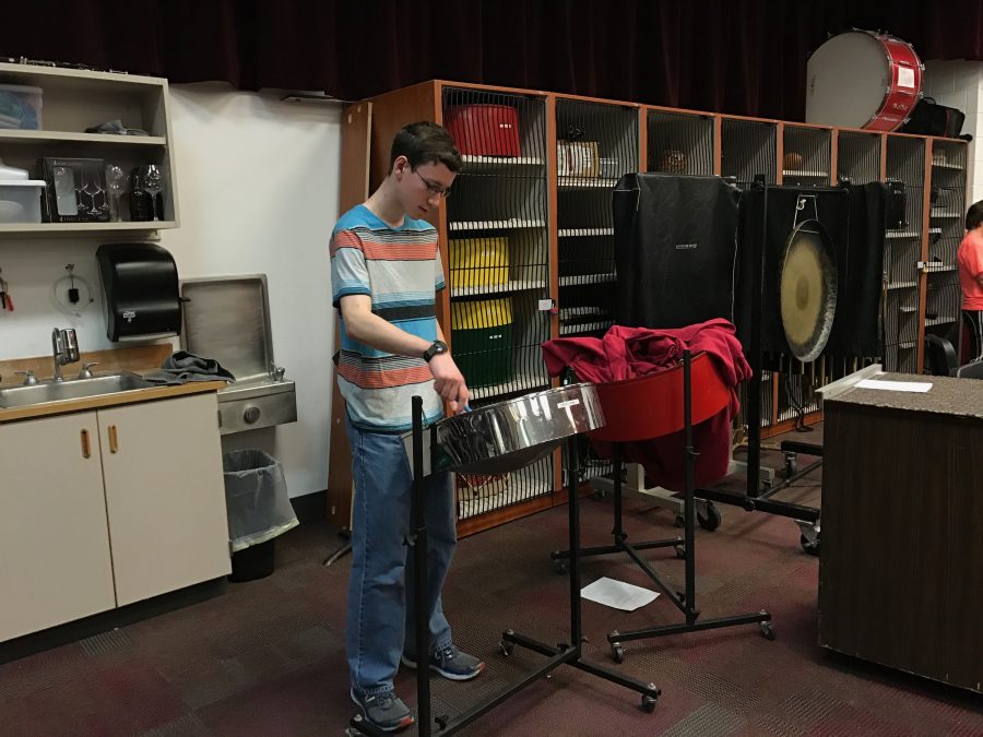 Alexander Pavlicin and his instrument in the band room. Along with playing music, Pavlicin has many different hobies and interests that he hopes to persure in his future. Pavlicin says, I hope to create new avenues to combine my interests in a meaningful way.
