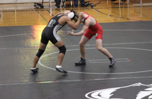 Junior, Jared Christian working his opponent in the Roseville meet. We have a lot of motivated guys on the team this season, and its really good to have a team that is bigger than just a few star athletes, Tyler Olsen says.