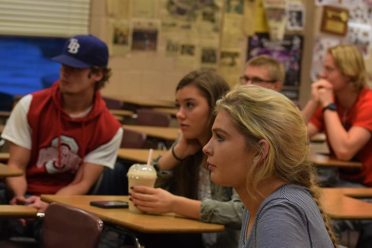 O’Neal (pictured center in green) looks on intentively in class, confirming points the lecturer makes to assure she has a solid understanding. Senior Alyssa Lammers says, “She is very attentive and participates a lot. You can tell she cares a lot about learning not just getting points.”